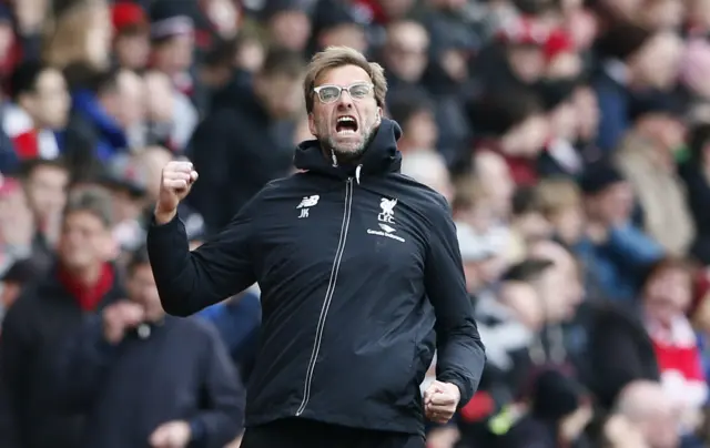 Jurgen Klopp celebrates Simon Mignolet's penalty save