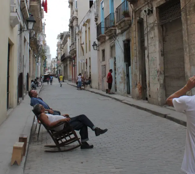 Arturo and friends discuss President Obama's visit in old Havana