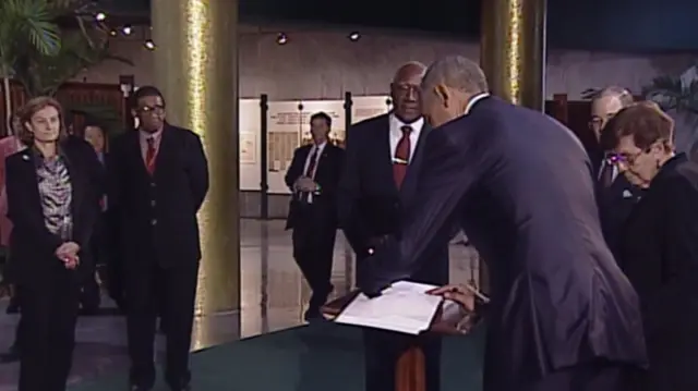 Obama signs guest book at Jose Mart Memorial