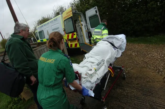 Ambulance crew with a patient prior to taking them to the John Radcliffe Hospital