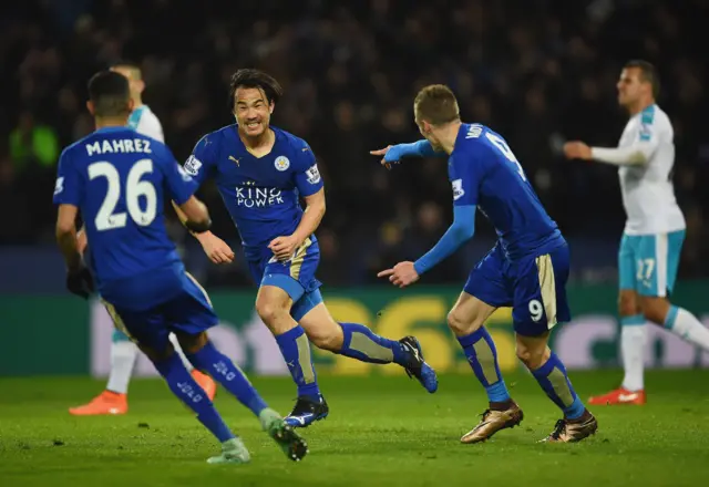 Shinji Okazaki of Leicester City celebrating with team mates as he scores