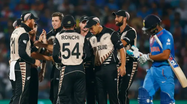 New Zealand celebrate a wicket against India