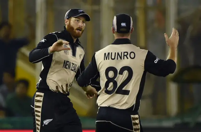 Munro and Guptill celebrate a wicket