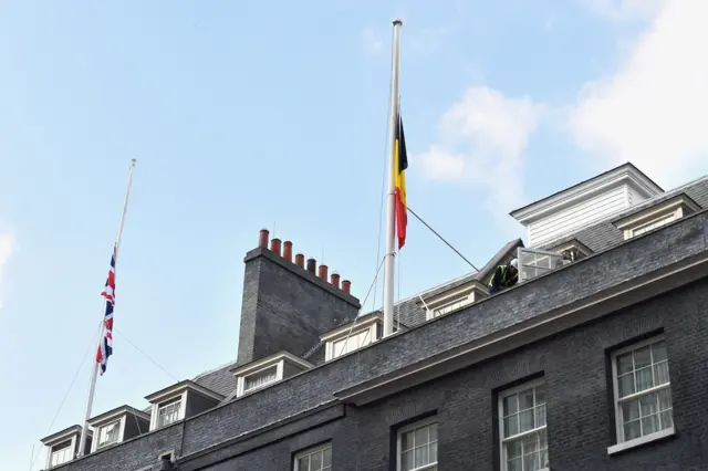 The Belgian national flag at half-mast as a mark of respect at Downing Street