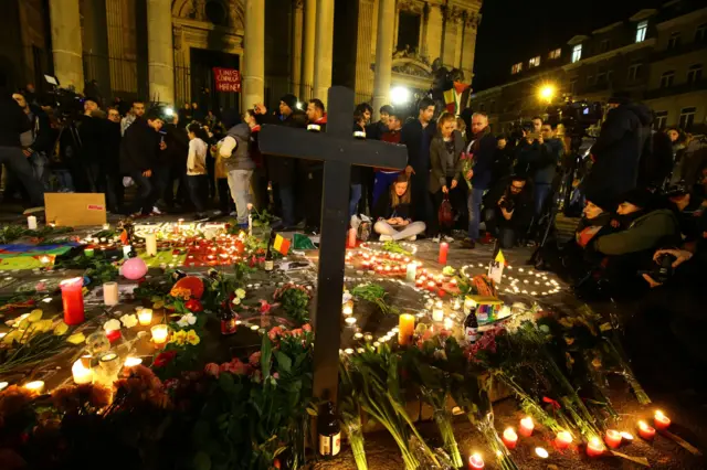 Members of the public gather at the Place de la Bourse in Brussels