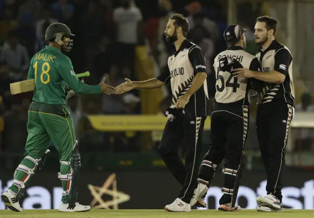 Players shake hands at the end of the game