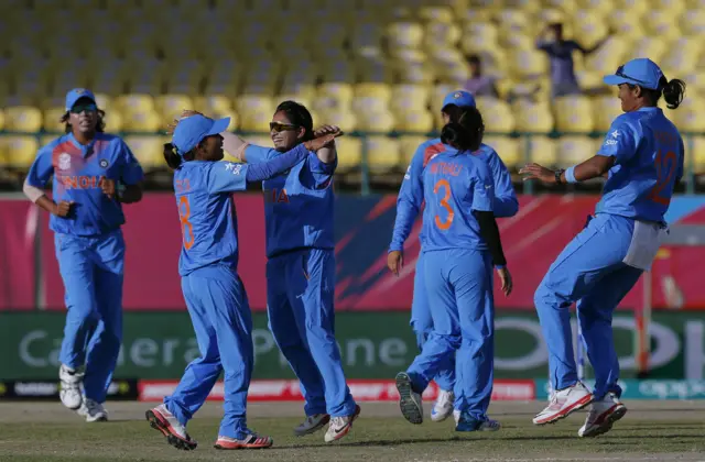 India celebrate taking a wicket