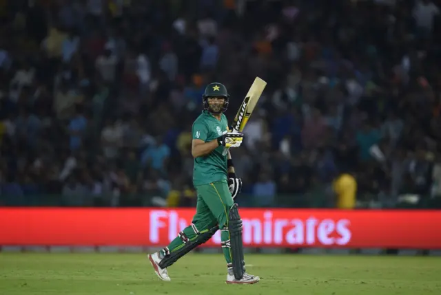 Afridi walks after being dismissed