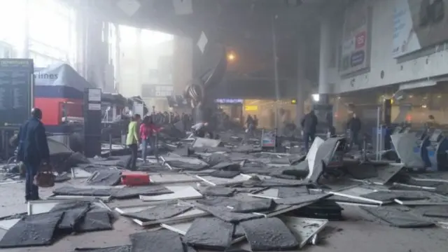 The aftermath in the departures hall at Brussels Zaventem airport following the explosions