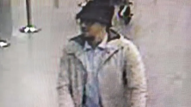 Photograph provided by Belgian Federal Police shows a CCTV grab of a suspect in the Zaventem airport attack in Brussels