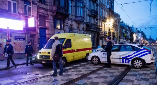 Police raided addresses in the Shaerbeek area of Brussels overnight