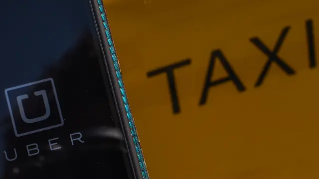 Mobile phone showing the Uber app