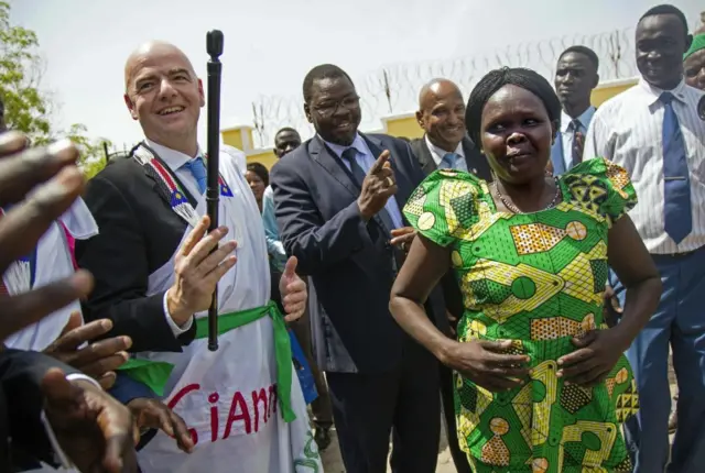 Infantino in traditional robes