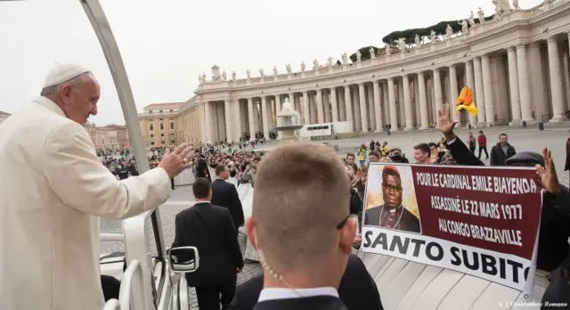 Pope Francis waving at people from Congo-Brazzaville at the Vatican