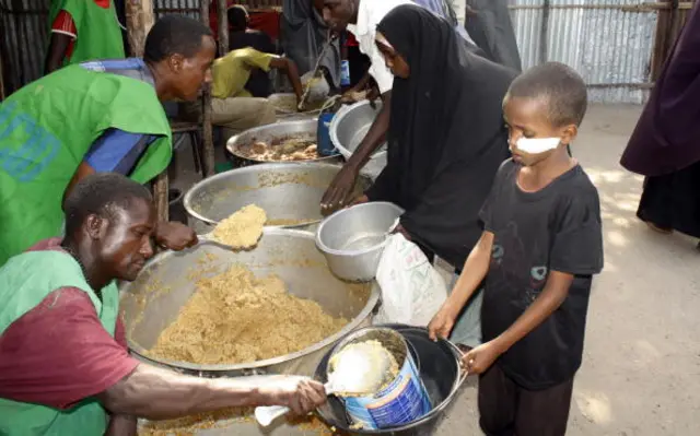 People receiving food aid in Somalia - archive shot