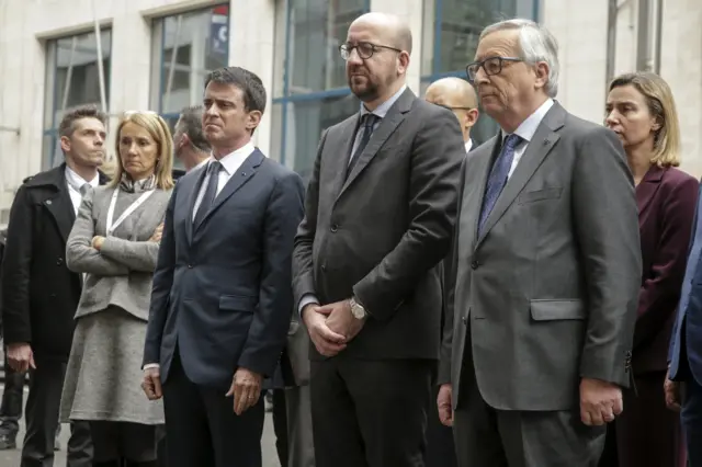 French PM Valls, Belgian PM Michel, European Commission President Jean-Claude Juncker and EU foreign policy chief Federica Mogherini pay tribute to the victims of a blast in the metro station of Maalbeek in Brussels