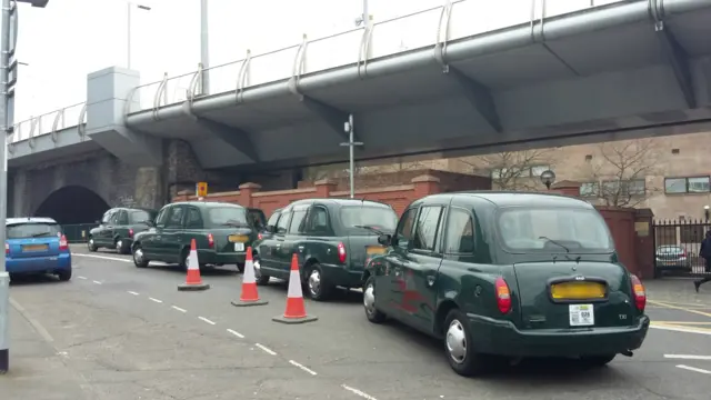 Taxis queuing station street