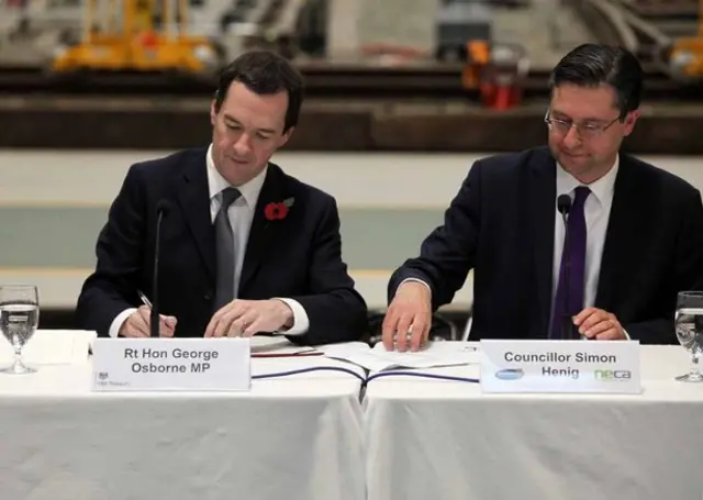 Chancellor George Osborne signs the Devolution agreement for the North East