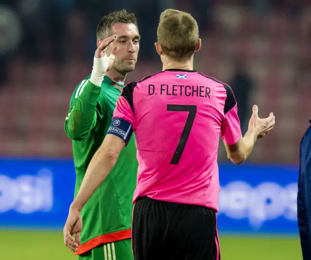 Scotland captain Darren Fletcher and Allan McGregor shake hands at the end of the match.