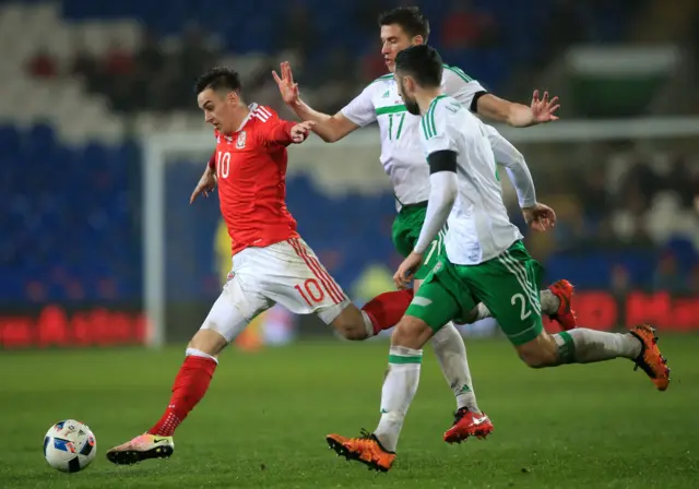 Wales' Tom Lawrence, left, and Northern Ireland's Patrick McNair