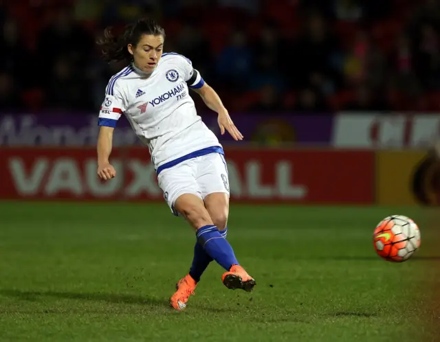 Karen Carney tucks away her spot kick