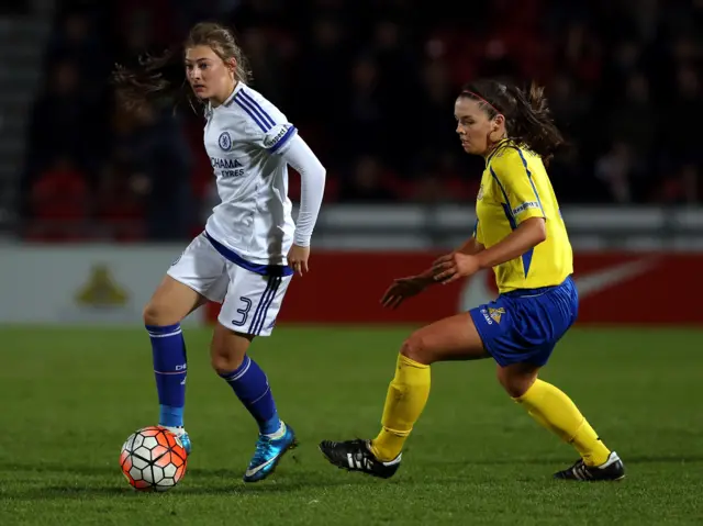 Sam Tierney (R) of Doncaster Rovers Belles challenges Hannah Blundell of Chelsea Ladies FC
