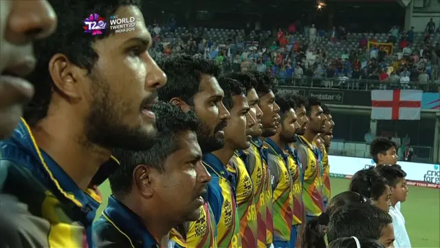 Sri Lanka players stand for their national anthem