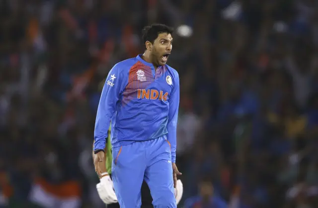 Yuvraj celebrates taking a wicket