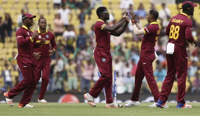 West Indies celebrate taking a wicket