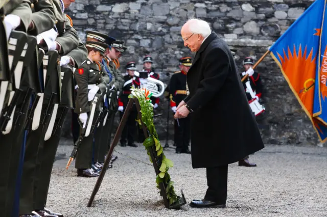 Irish President Michael D Higgins lays a wreath at Kilmanham Gaol