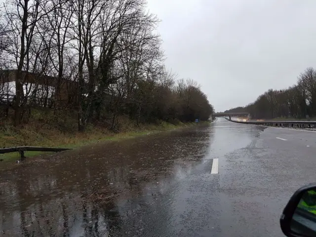 a section of the northbound M6 between junction 13 and junction 14 near Stafford that was closed due to the deluge of heavy rain brought on by Storm Katie