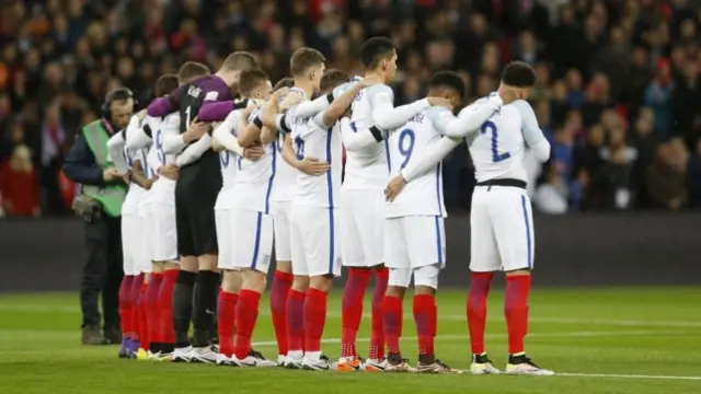 England players during a minutes silence