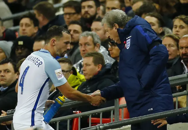 Danny Drinkwater shakes hands with Roy Hodgson