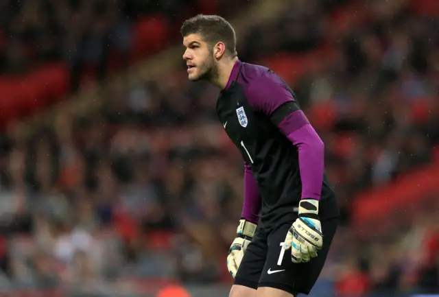 Fraser Forster looks on