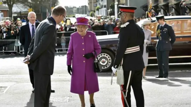Queen Elizabeth II arrives at the Lister Community School in London