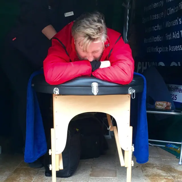 Robbie Savage gets a massage