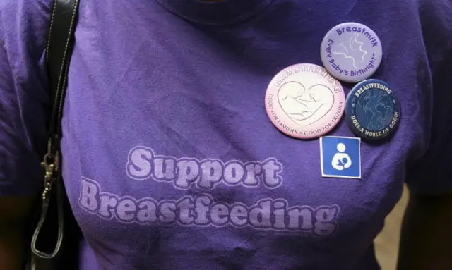 A woman with a "support breastfeeding" T-shirt in the US in 2006