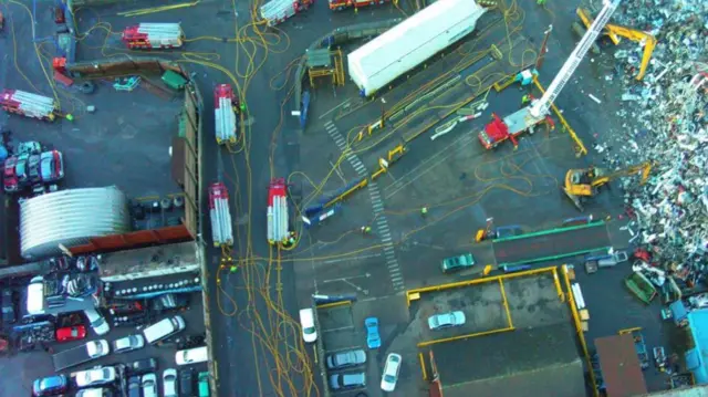 Hoses at the recycling plant fire