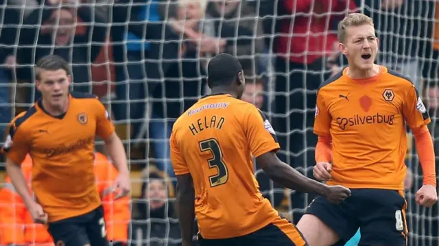 Wolves celebrate George Saville scoring against Derby County