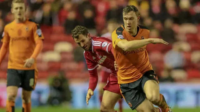 Wolves' Kevin McDonald runs past his marker