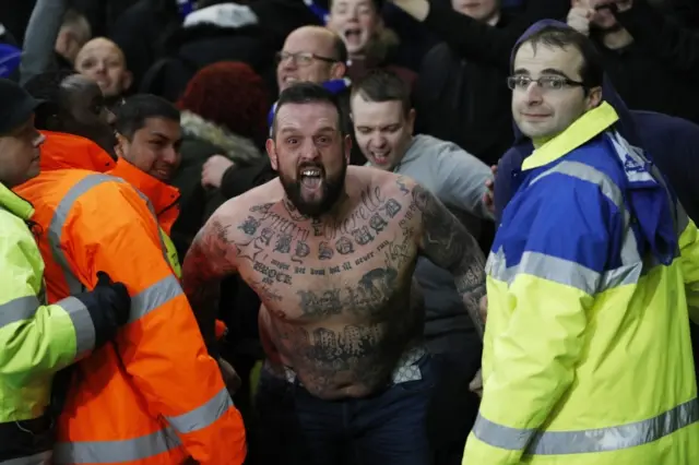 A Leicester fan covered in tattoos