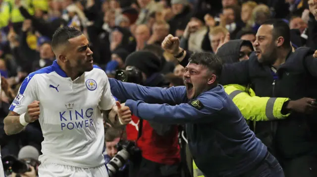 Danny Simpson celebrates with the Leicester fans