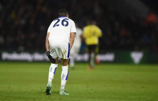 Riyad Mahrez clutches his hamstring