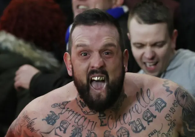 A Leicester fan covered in tattoos