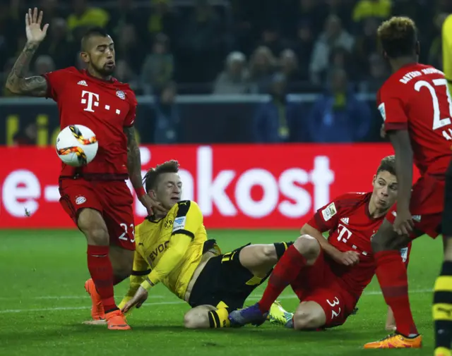 Arturo Vidal launches in to a tackle