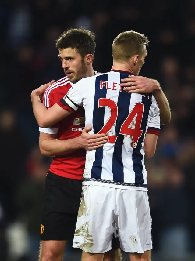 Michael Carrick embraces former teammate Darren Fletcher