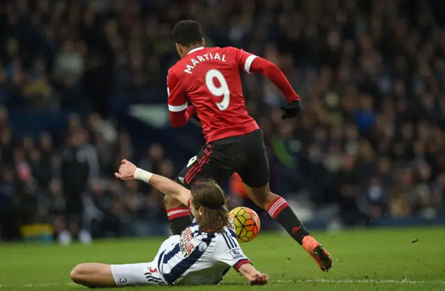 Jonas Olsson drags down Anthony Martial