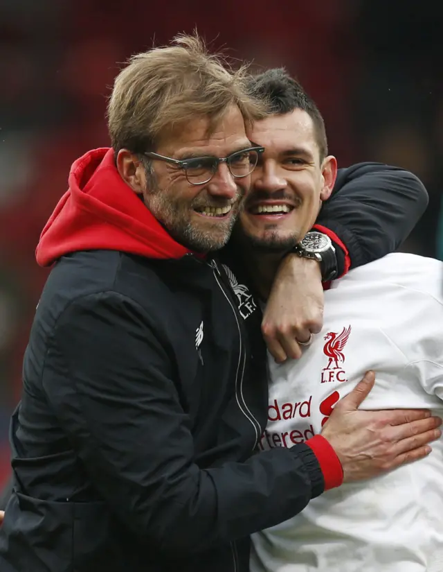 Jurgen Klopp and Dejan Lovren celebrate the win