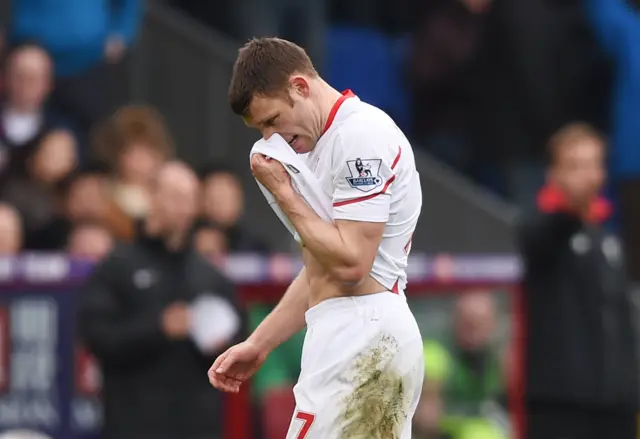 Liverpool's James Milner is sent off