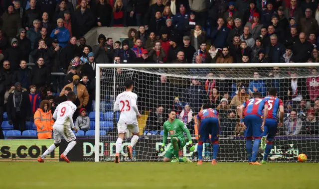 Christian Benteke slots in the penalty